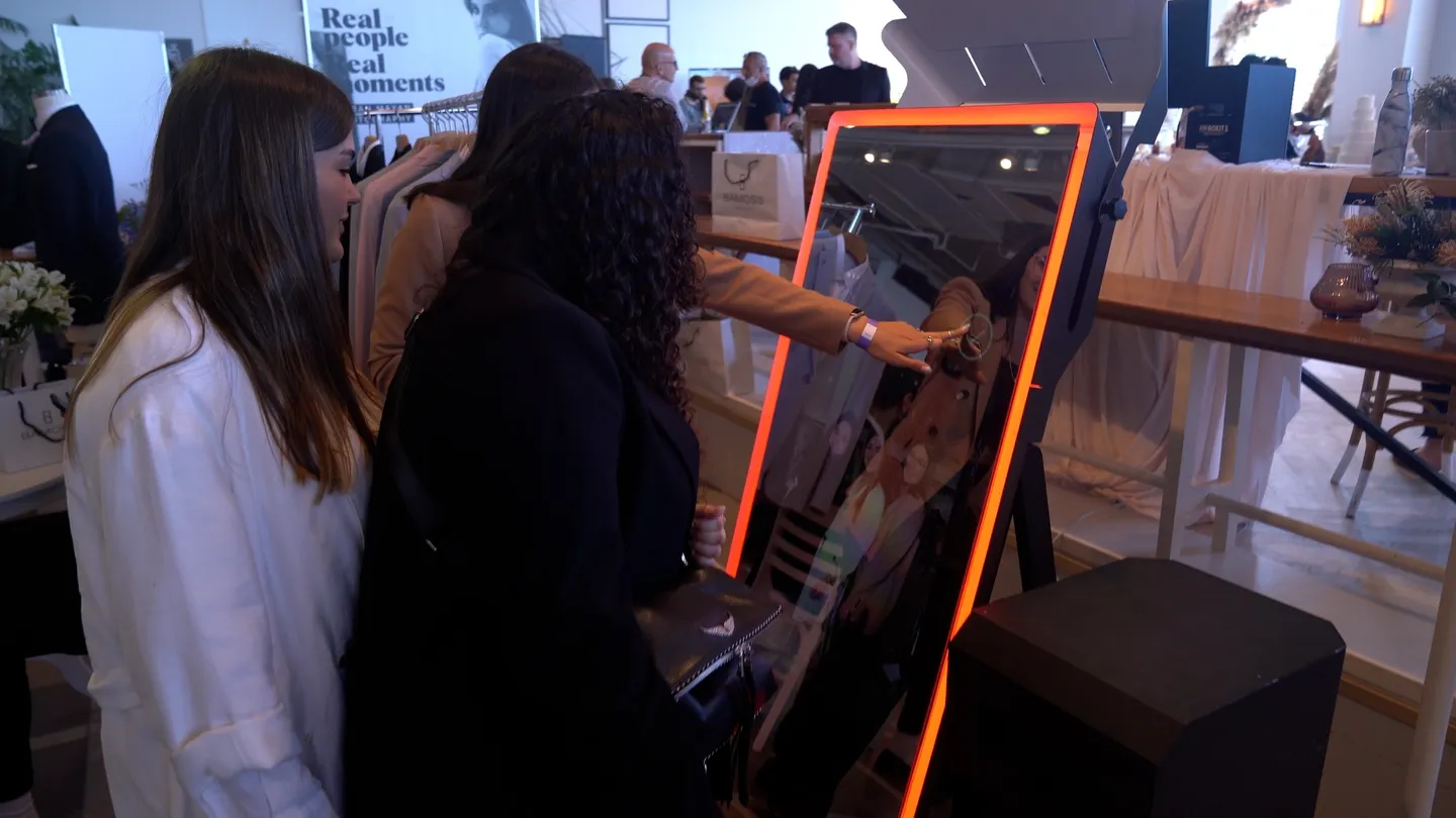 A woman is painting on an easel